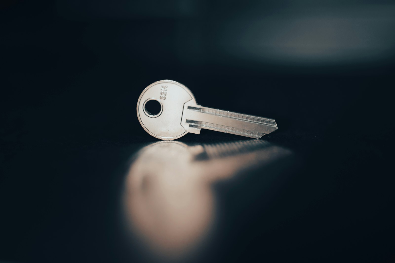Set of door keys on a white surface
