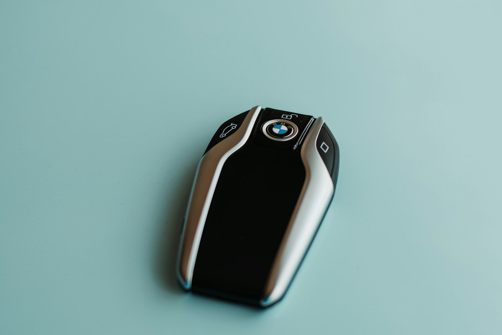 Modern car key fob on a table